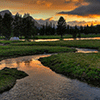 Sunset Over A Creek Jigsaw Puzzle