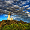 Lighthouse On A Hill Jigsaw Puzzle