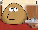 play Pou Washing Dishes