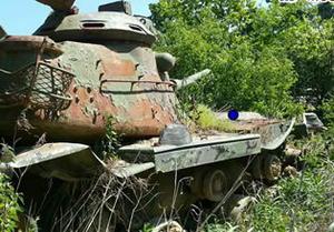 play Abandoned Tank Forest Escape Game