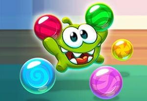 play Om Nom Bubbles