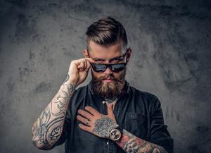 play The Man With The Tattoo